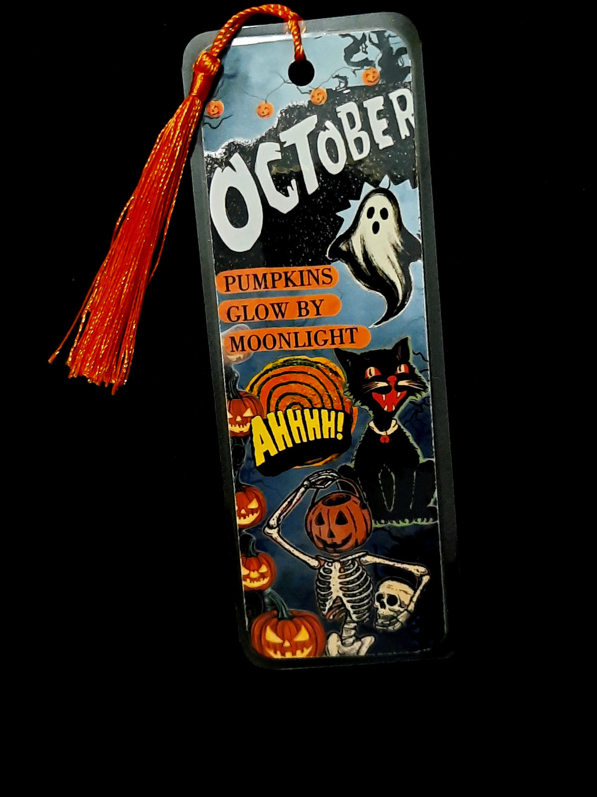 Vintage Halloween themed bookmark Laminated with tassel. 