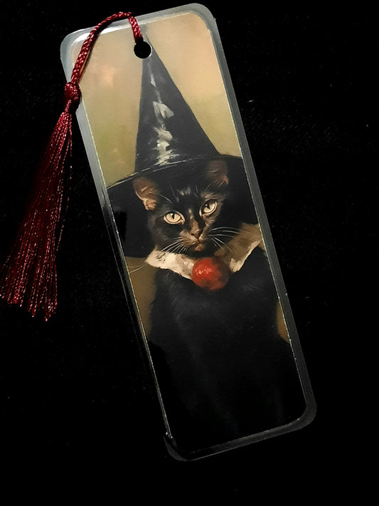 Witchy black cat laminated bookmark. 